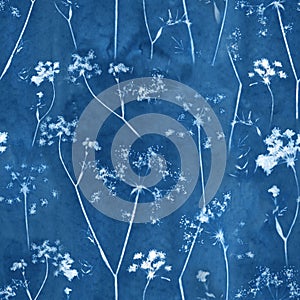 Beautiful floral abstract seamless pattern in cyanotype style with silhouette of flowers. Abstract handmade print design. Stock photo