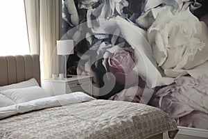 Beautiful floral photoart work used as wallpaper in bedroom