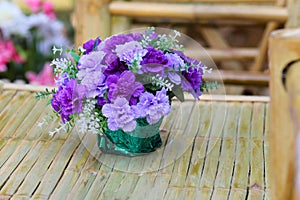 Beautiful flower bouquet on wooden table