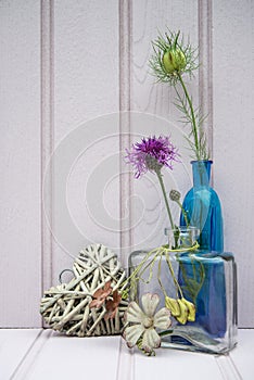 Beautiful flower in vase with heart still life love concept