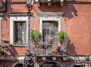 Beautiful flowered balcony in Taormina city - Taormina, Sicily, Italy