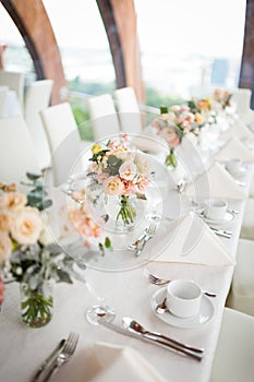 Beautiful flowers as dining table decoration