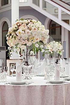 Beautiful flowers on table in wedding day. Luxury holiday background.