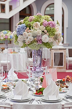 Beautiful flowers on table in wedding day. Luxury holiday background.