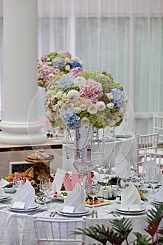 Beautiful flowers on table in wedding day. Luxury holiday background.