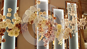 Beautiful flowers on the wedding decor in the restaurant