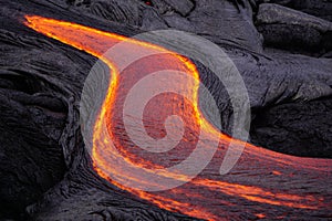 Flowing lava in Hawaii photo