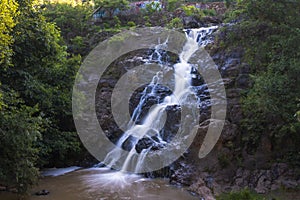 Beautiful flowing waterfall in Los Filtros Viejos Park at Morelia, Michoacan, Mexico photo