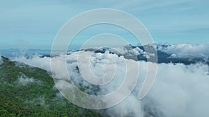 Beautiful Fog over Mountains in Thailand,Amazing clouds over mountains.Aerial view landscape of mountain peak with misty cloud