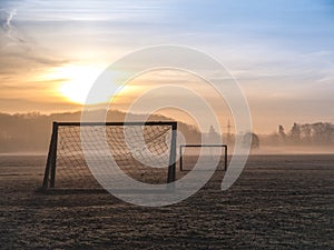 Beautiful foggy soccer pitch