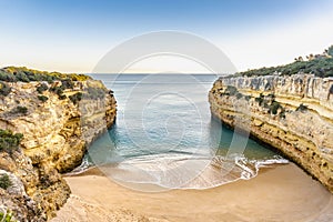 Beautiful Fontainhas Beach surrounded by yellow cliffs, Algarve, Portugal