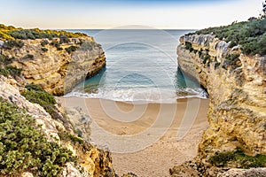 Beautiful Fontainhas Beach surrounded by yellow cliffs, Algarve, Portugal