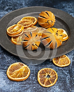 Beautiful food portrait of Wnter seasonal dried fruits with old vintage texture background and cutlery and accessories