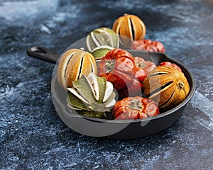 Beautiful food portrait of Wnter seasonal dried fruits with old vintage texture background and cutlery and accessories