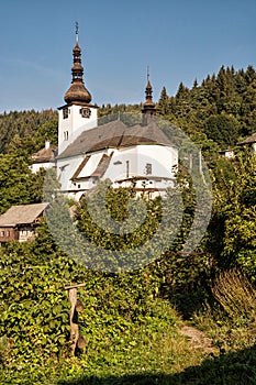 Beautiful fortified church in Spania Dolina, Slovakia, photo filter