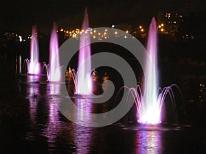 Beautiful fountains with evening illumination. Rusanovka. Kiev.