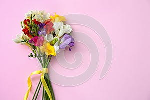 Beautiful freesia bouquet with ribbon