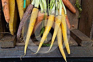 Beautiful fresh carrots in a wooden box