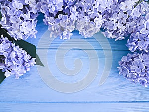 Beautiful fresh lilac decoration greeting anniversary mothers day gift holiday on a wooden background border