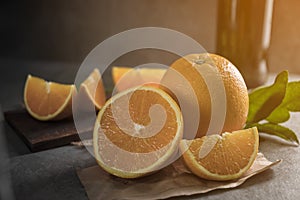 Beautiful, fresh orange on the dark background. Healthy sweet food concept