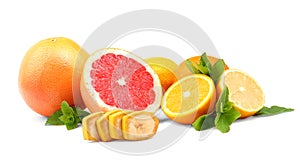 Beautiful fresh sliced citrus fruits and mint, on a white background. The concept of healthy eating. Vitamin C.
