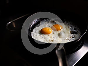 Beautiful fried eggs in pan photo