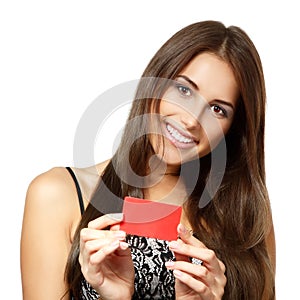 Beautiful friendly smiling confident girl showing red card in ha