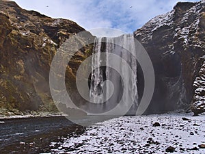 Beautiful front view of stunning waterfall SkÃÂ³gafoss, a popular tourist destination on the south coast of Iceland.