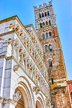 The frontage of Saint Martin of Tours Cathedral in Lucca, Italy photo