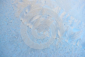 beautiful frost patterns background of ice on window