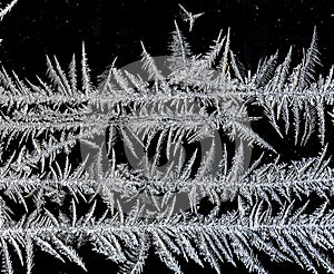 beautiful frosty patterns on the window glass