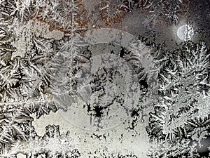 beautiful frosty patterns on the window glass
