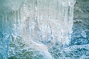 A beautiful frozen icicles at the bank of river in Latvia.