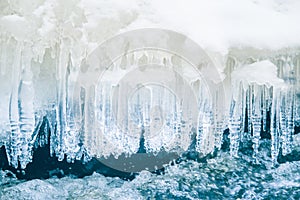 A beautiful frozen icicles at the bank of river in Latvia.