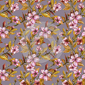 Beautiful fruit tree twigs in bloom on gray background. Pink flowers and yellow leaves. Seamless springtime floral pattern.