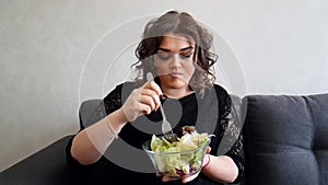 Beautiful full girl with salad dieting vegetable