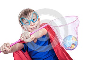 Beautiful funny child dressed as superman saving the Earth