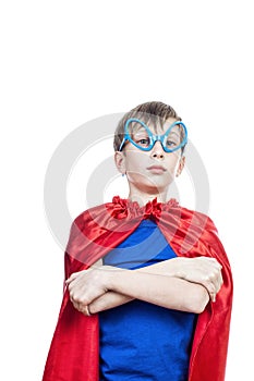 Beautiful funny child pretending to be superhero standing