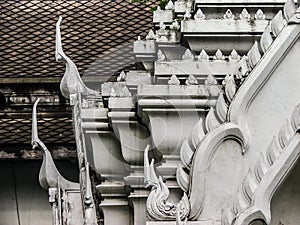 Beautiful gable apex stucco on the roof of Thai temple