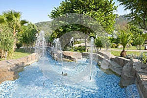 Beautiful garden with azure fountain