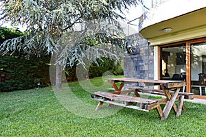 A beautiful garden with an old table inside