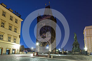 Beautiful gate to the Charles bridge in Prague at night, Czech Republic