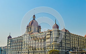 Beautiful Gateway of India near Taj Palace hotel on the Mumbai harbour with many jetties on Arabian sea