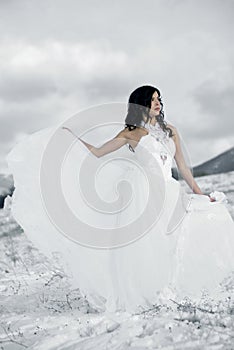 The beautiful gentle girl in white dress