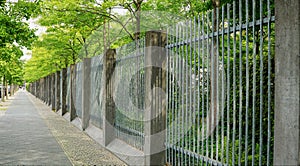 Beautiful geometric fence and long walkway in Central Berlin, Germany