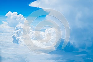 Beautiful Giant white cumulonimbus clouds against the background of the bright deep blue sky in tropical summer climate weather