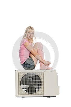 Beautiful girl with the air conditioner