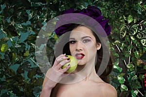 Beautiful girl with apple