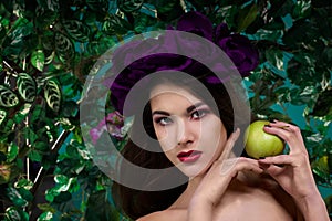 Beautiful girl with apple