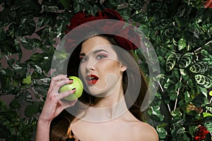 Beautiful girl with apple